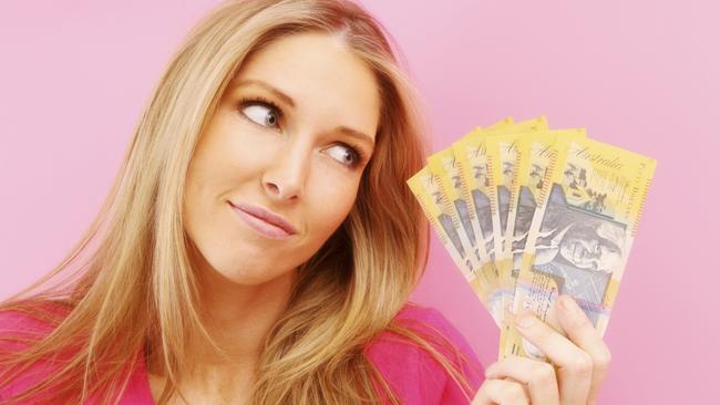 Woman with cash. Picture: iStock