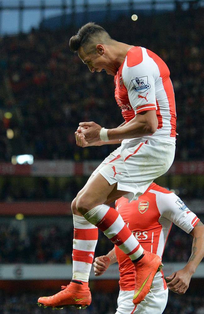 Arsenal's Chilean striker Alexis Sanchez celebrates.