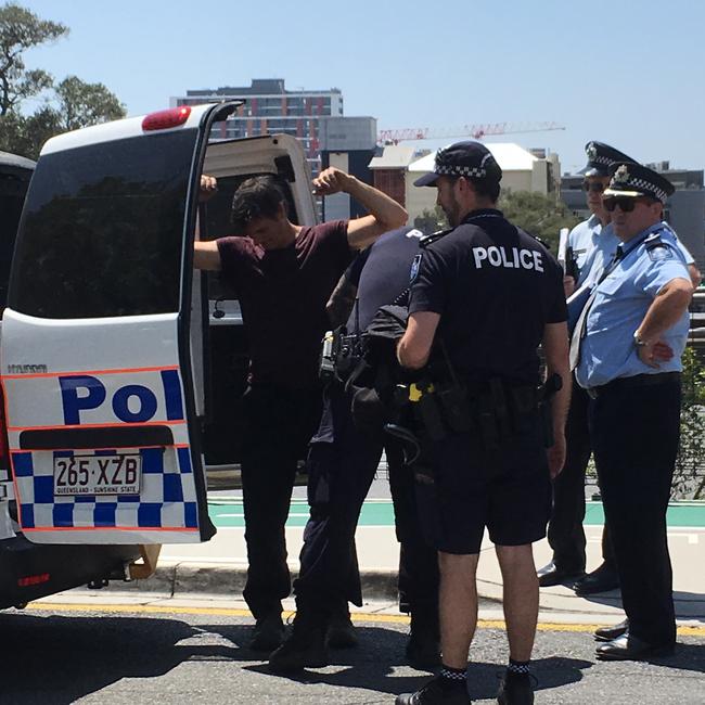 Alleged Story Bridge protester Paul Jukes has been taken into custody. Picture: Nicole Pierre