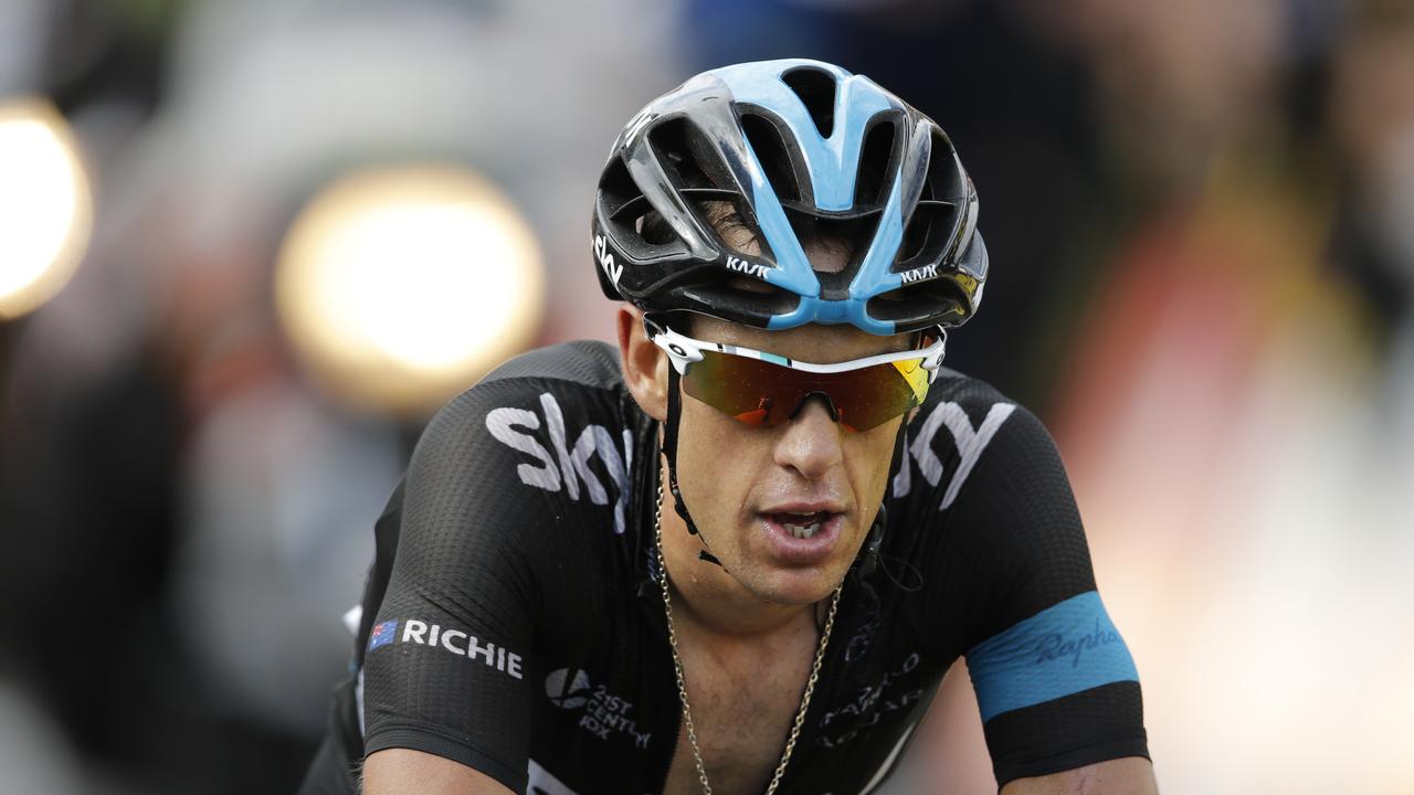 Australia's Richie Porte crosses the finish line of the tenth stage of the Tour de France cycling race over 161.5 kilometers (100.4 miles) with start in Mulhouse and finish in La Planche des Belles Filles, France, Monday, July 14, 2014. (AP Photo/Peter Dejong)