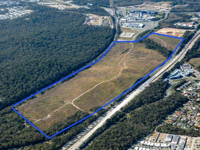 Aerial photo of Lot 1, Pacific Highway, a 54.99ha site near Westfield Coomera which is now on the market. Picture: Supplied by Colliers