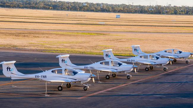 Planes on the tarmac at the Parafield airport flight training school.