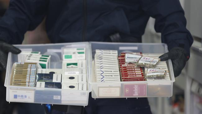 Police raid businesses searching for illegal tobacco.