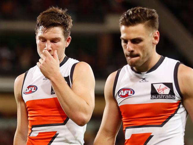 ADELAIDE, AUSTRALIA - SEPTEMBER 07: Toby Greene (left) and Stephen Coniglio of the Giants look dejected after a loss during the AFL First Qualifying Final match between the Adelaide Crows and the Greater Western Sydney Giants at Adelaide Oval on September 7, 2017 in Adelaide, Australia. (Photo by Michael Willson/AFL Media/Getty Images)