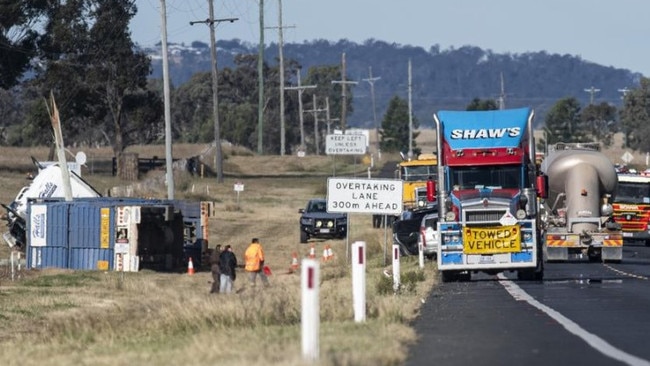 Emergency services at the scene of the fatal crash on the Warrego Highway, east of Oakey, Sunday, June 9, 2024. Picture: Kevin Farmer