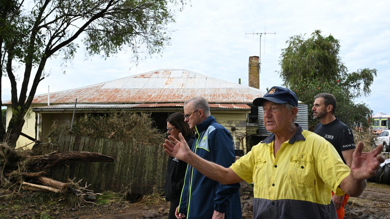 Dairy farmer Milton Johnston shows Prime Minister Anthony Albanese around his property. Picture: Dean Lewins