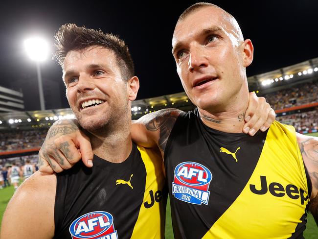 BRISBANE, AUSTRALIA - OCTOBER 24: Trent Cotchin and Dustin Martin of the Tigers (right) celebrate during the 2020 Toyota AFL Grand Final match between the Richmond Tigers and the Geelong Cats at The Gabba on October 24, 2020 in Brisbane, Australia. (Photo by Michael Willson/AFL Photos via Getty Images)