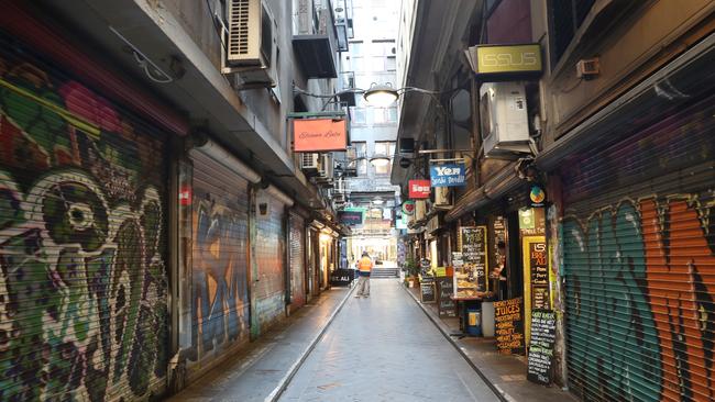 Many DeGraves St traders are closed and others are struggling to survive. Picture: David Crosling