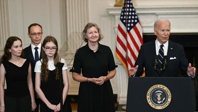 US President Joe Biden, standing alongside family members of the freed prisoners, speaks about the prisoner exchange with Russia on August 1, 2024. (Photo by Brendan SMIALOWSKI / AFP)