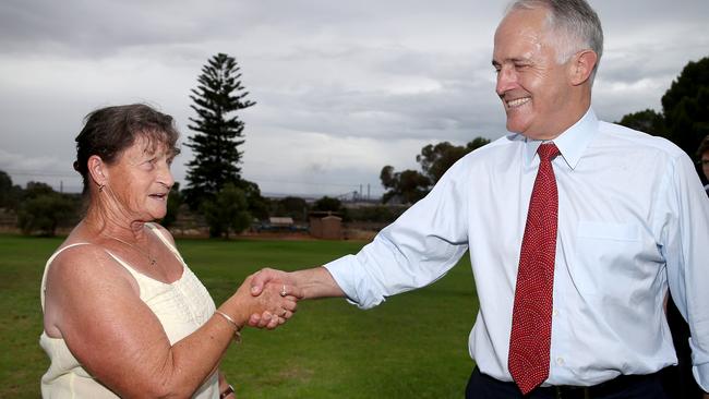 Victor Harbor resident Raylene Mullins debates Prime Minister Malcolm Turnbull on the benefits of free trade during his visit to Whyalla on Wednesday.