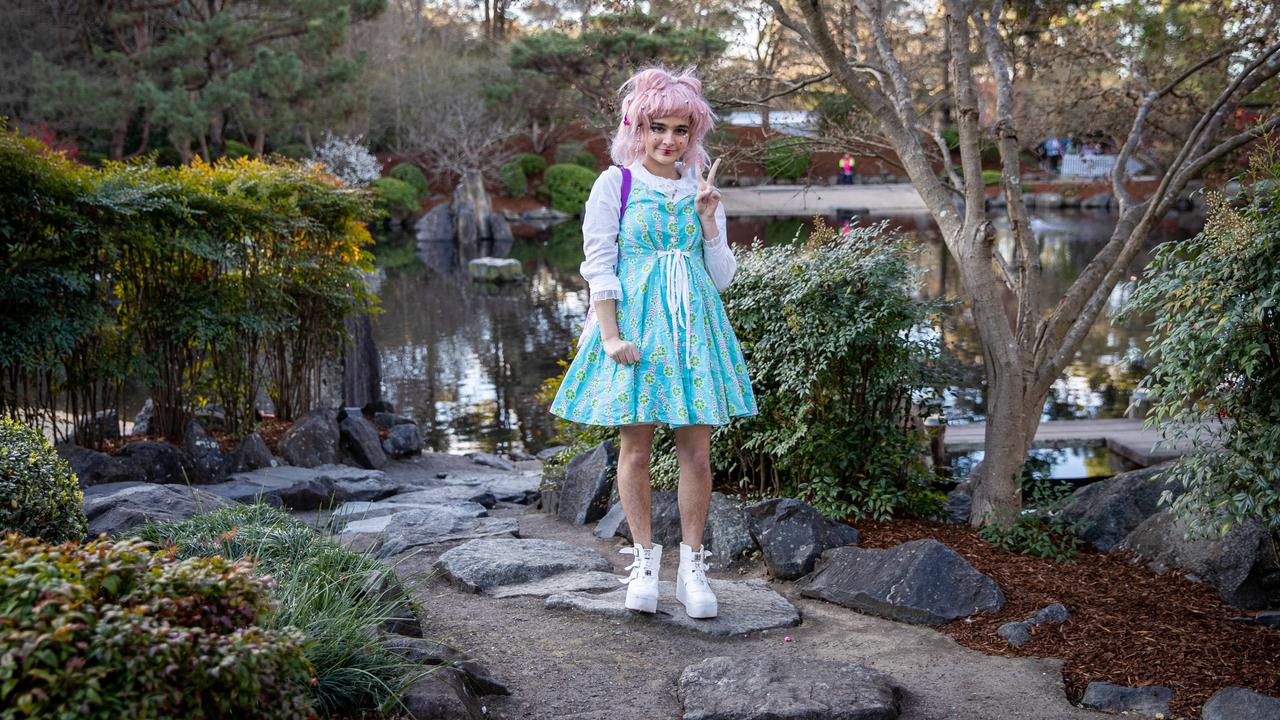 A festivalgoer is tickled pink to be at the gardens. Picture: Christian Gilles