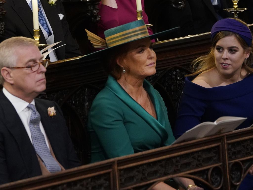 Princess Beatrice with her parents, Prince Andrew and Sarah Ferguson, at the wedding of Princess Eugenie. Picture: Getty Images