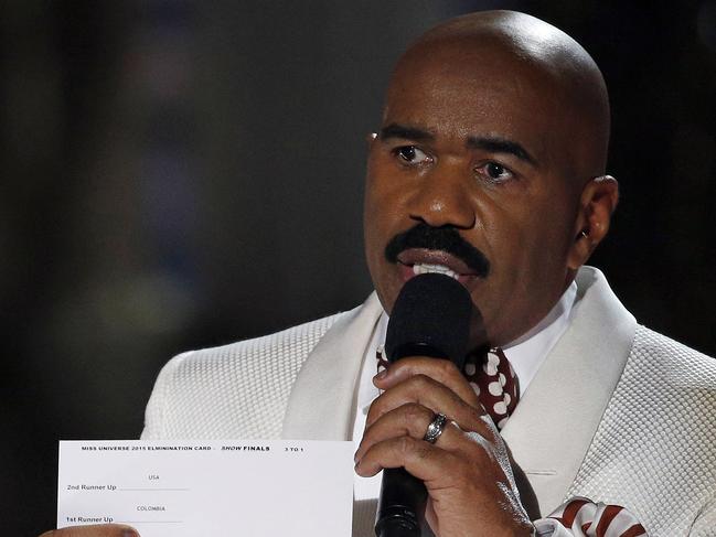 Steve Harvey holds up the card showing the winners after he incorrectly announced Miss Colombia Ariadna Gutierrez as the winner at the Miss Universe pageant on Sunday, Dec. 20, 2015, in Las Vegas. Miss Philippines Pia Alonzo Wurtzbach was named Miss Universe. (AP Photo/John Locher)