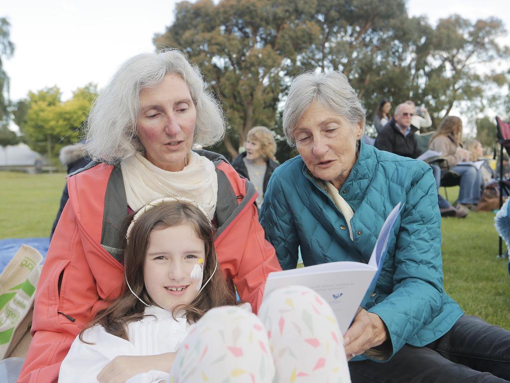 SOCIALS Toni Shea-Butler, left, Gabrielle Shea-Butler, 7, and Sandy Nolan, all of Sandy Bay at the Carols on the Hill, Guilford Young College, West Hobart. Picture: MATHEW FARRELL