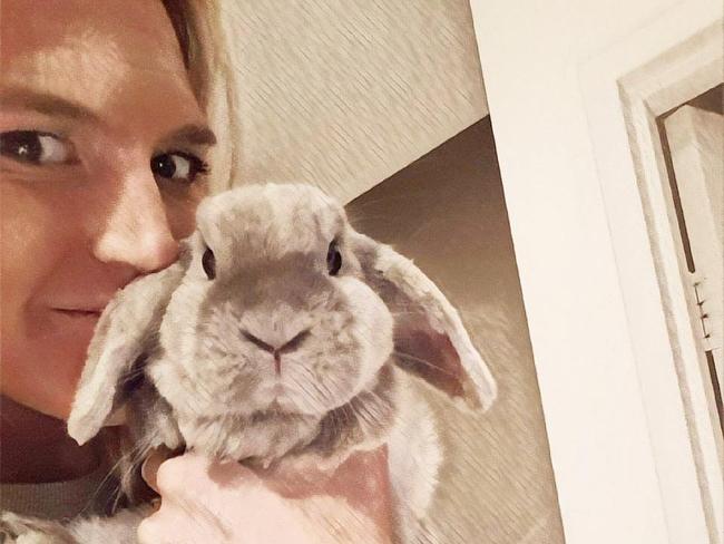 Caitlin Bassett with her rabbit.