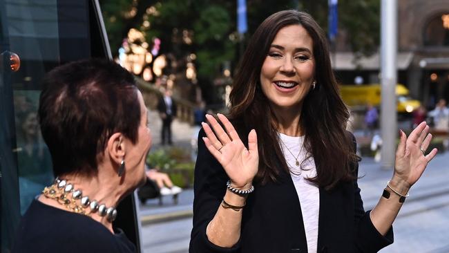 Denmark’s Crown Princess Mary (right) speaks with Sydney Lord Mayor Clover Moore following a tour of the light rail in Sydney on Friday. Picture: AFP