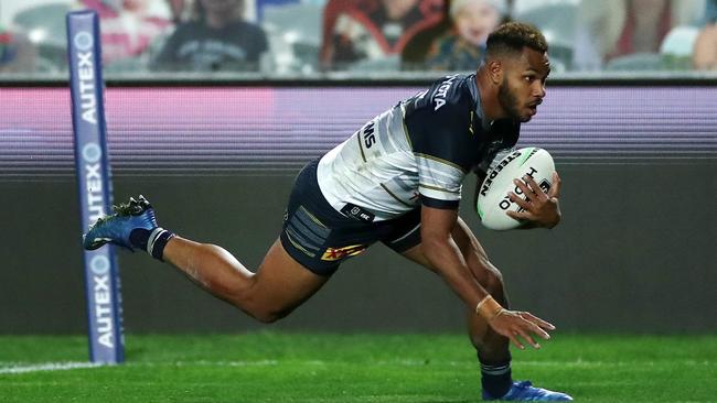 Hamiso Tabuai-Fidow of the Cowboys scores a try, which was then disallowed by the video referee. (Photo by Cameron Spencer/Getty Images)