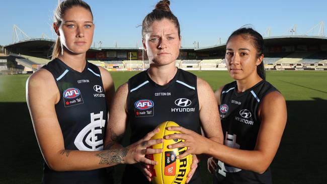 Carlton players Tayla Harris, Bri Davey and Darcy Vescio ahead of the AFLW grand final. Picture: Alex Coppel