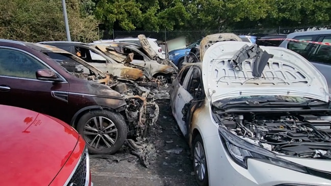 Five cars destroyed by fire after lithium-ion battery ignites in Sydney airport parking lot