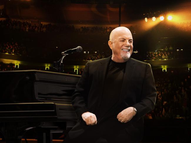 Billy Joel playing at Madison Square Garden for a concert special.
