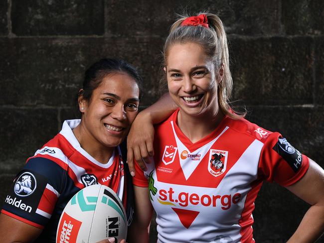 Sydney Roosters player Simaima Taufa and St George-Illawarra Dragons player Kezie Apps pose for a photo during the NRL Women's Premiership Season launch in Sydney, Tuesday, September 3, 2019. (AAP Image/Joel Carrett) NO ARCHIVING