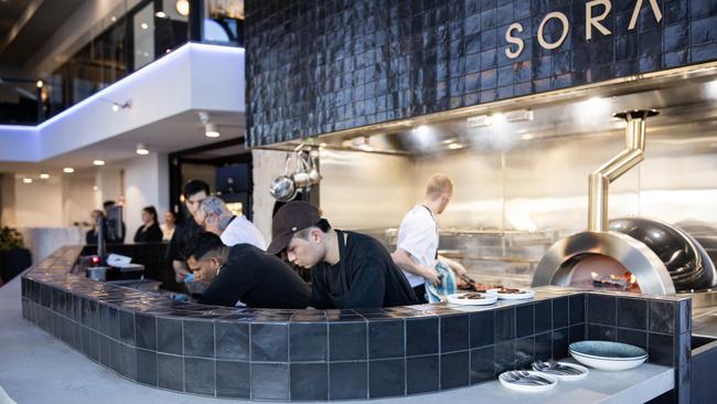 The kitchen in action at Sora rooftop restaurant in Pirie St. Picture: Ben Macmahon