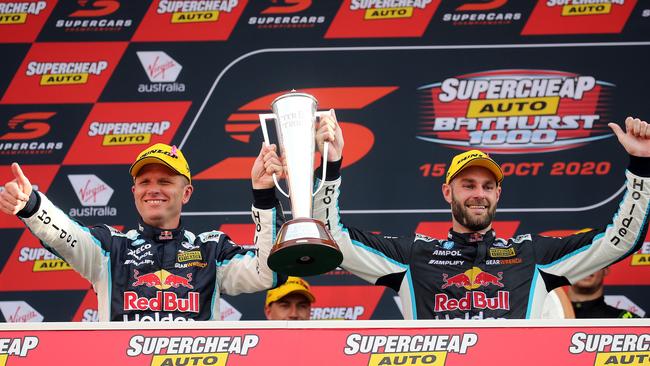 DAILY TELEGRAPH - Pictured is Shane van Gisbergen and Garth Tander from Redbull Holden Racing Team, celebrating after winning the Supercheap Auto Bathurst 1000 at Mount Panorama Raceway today. Picture: Tim Hunter.