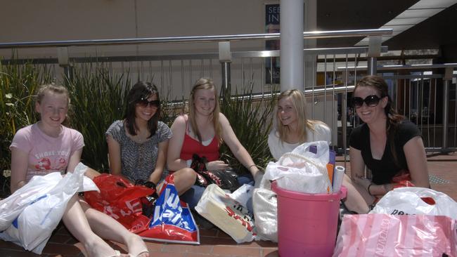 Molly, Laura, Jade, Stacie and Tess rest after a busy morning shopping.