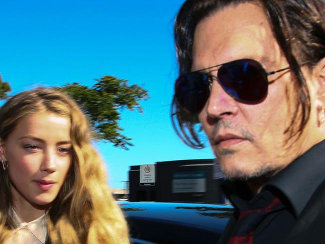 (FILES) A file photo taken on April 18, 2016, show US actor Johnny Depp (R) and his former wife Amber Heard arriving at a court in the Gold Coast. Johnny Depp's Australian nemesis, Deputy Prime Minister Barnaby Joyce, suggested on June 27, 2017 he could unleash perjury charges against the Hollywood A-lister in the latest chapter to a case dubbed the "war on terrier". Depp and his then-wife Amber Heard fell foul of Australia's strict quarantine laws when they failed to declare her pet dogs Pistol and Boo on arrival in the country on a private jet in 2015.  / AFP PHOTO / PATRICK HAMILTON