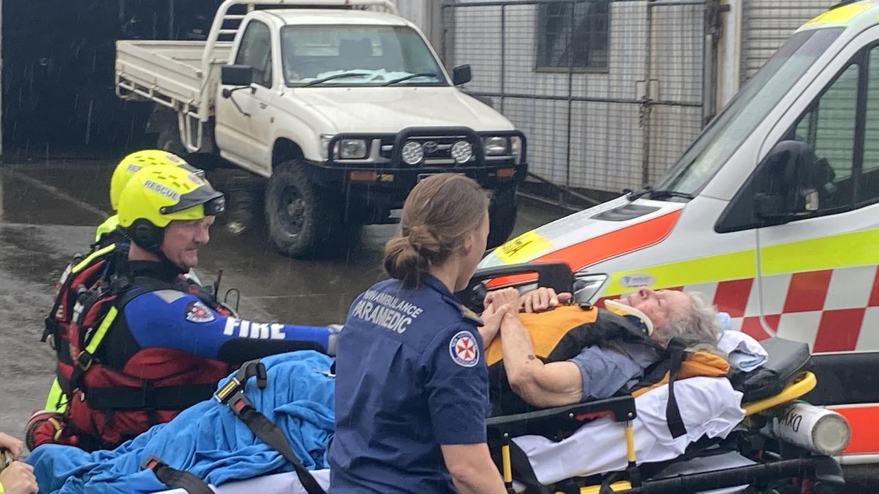 The dramatic rescue of a woman believed to be in her 80s, rescued form flood waters near Kempsey.