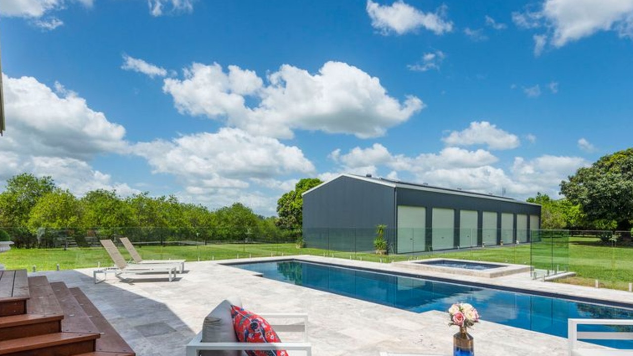 Out the back of this sprawling parcel there is a 12m mineral heated pool and an eight-person spa. Picture: Supplied