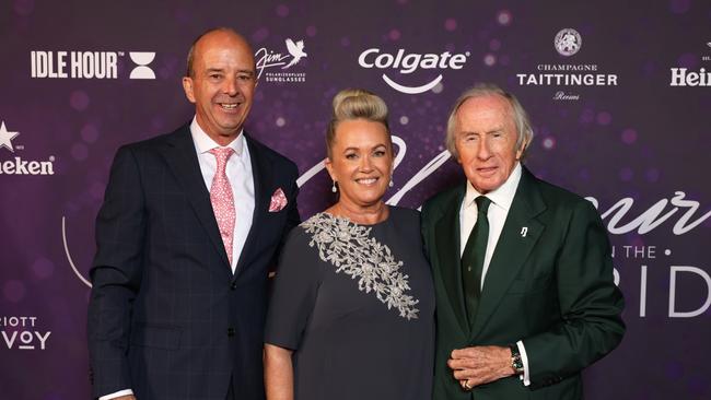 Andrew and Tina Westacott and Sir Jackie Stewart at the Melbourne Grand Prix.