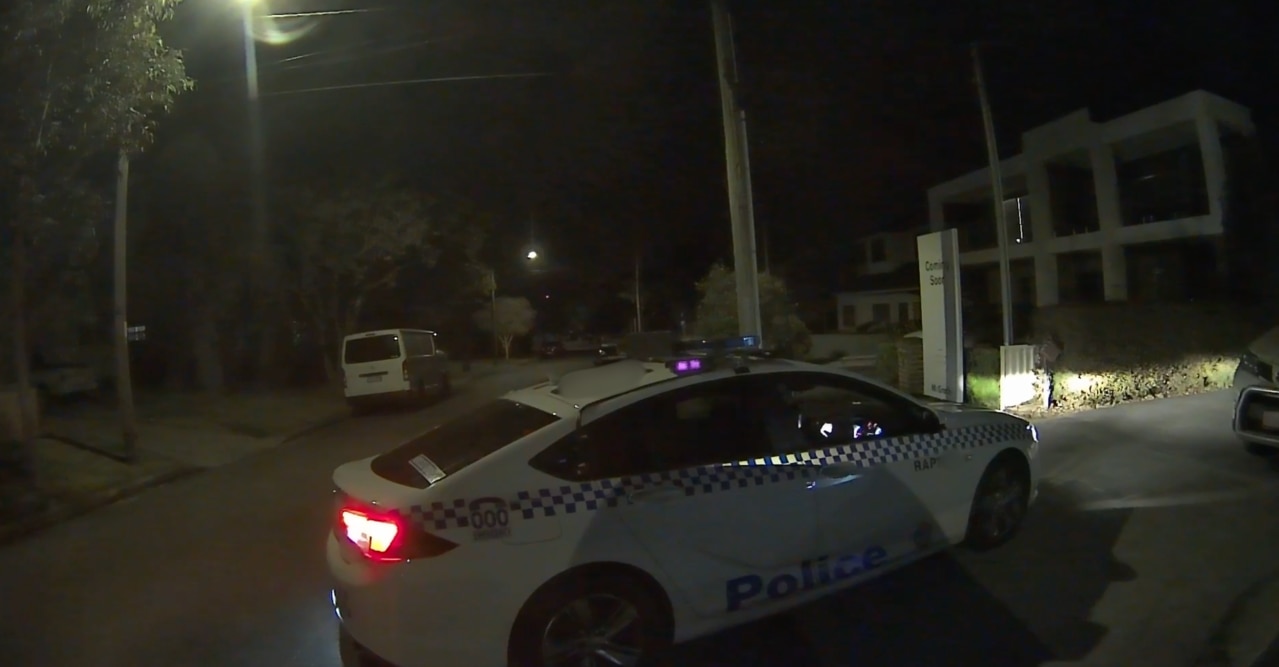 A police car marked “RAP” outside the couple’s home. Picture: Supplied