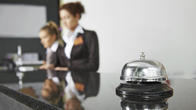 Modern luxury hotel reception counter desk with bell