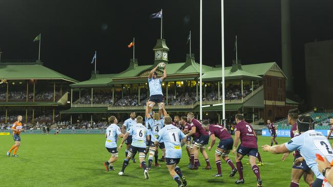 Waratahs win a line out during their historic match against the Reds at the SCG.