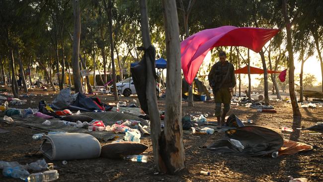 Israeli soldiers at the Supernova Music Festival site in Kibbutz Re’im. Picture: Getty Images