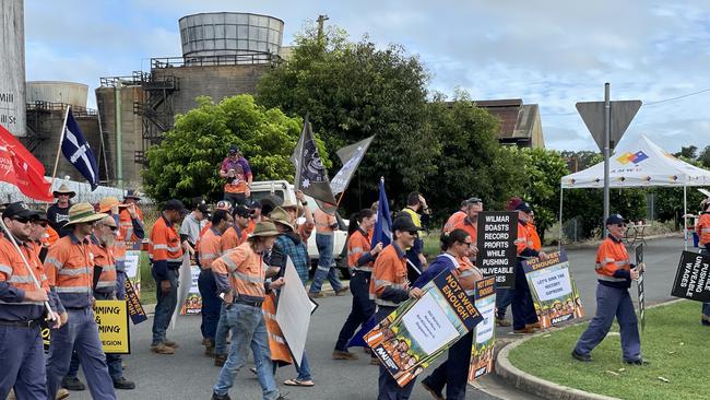 The striking workers, stationed outside the Plane Creek mill along the Bruce Highway, were unable to speak out alone for fear of repercussions from Wilmar. Photo: Fergus Gregg