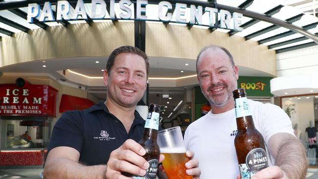 Signature Hospitality CEO James Sinclair and 4 Pines CEO Todd Atkinson at the new venue, the former Hard Rock Cafe site in Surfers Paradise’s Paradise Centre. Picture: Tertius Pickard