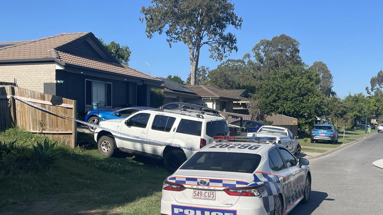 Police outside a Bellmere property where a man was shot during a violent home invasion. Picture: Aaron Goodwin