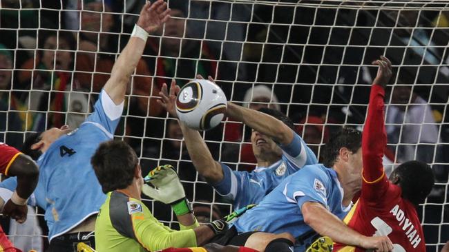 Luis Suarez deliberately stopped a certain goal with his hands when Uruguay played Ghana at the 2010 World Cup. Picture: AFP