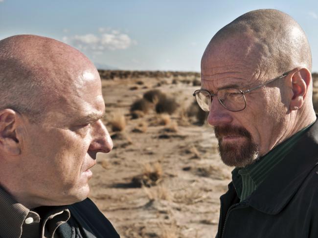 This publicity image released by AMC shows Dean Norris as Hank Schrader, left, and Bryan Cranston as Walter White in "Breaking Bad." The series is returning for its eight final episodes starting Sunday at 9 p.m. EDT. The long-awaited showdown places Hank in direct conflict with the villainous hero, Walter White. (AP Photo/AMC, Frank Ockenfels)