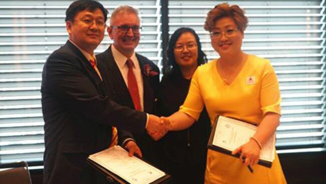 Sally Zou with a representative from the China Gold Group, NSW Energy and Resources Minister Don Harwin and Chinese Embassy commerce counsellor Wang Hongbo in March.