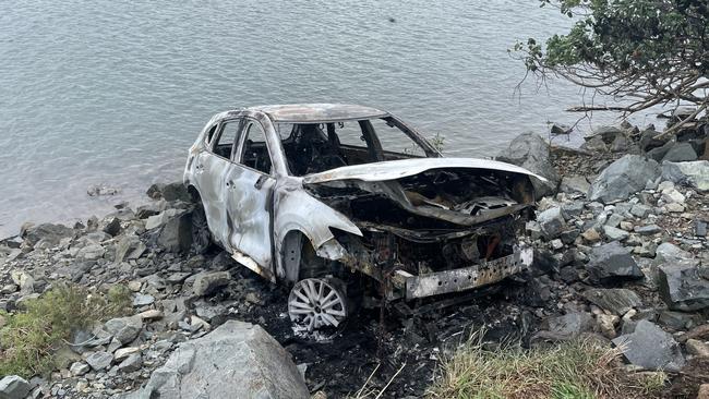 Police are investigating following a car fire by the Pioneer River just before 12.30pm. Photo: Fergus Gregg