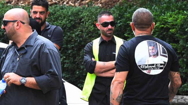 Mourners gather ahead of Hawi's funeral, following his shooting death last week. Picture: AAP