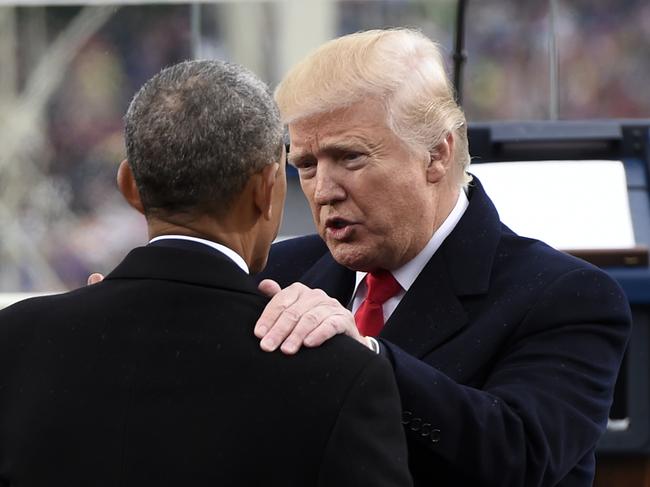 President Donald Trump talks with former President Barack Obama on Capitol Hill in Washington on January 20, 2017, after Trump took the presidential oath. Picture: AP