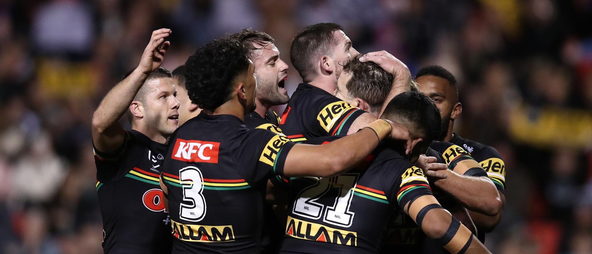 Panthers Players Lead Their Team Into The Stadium Background