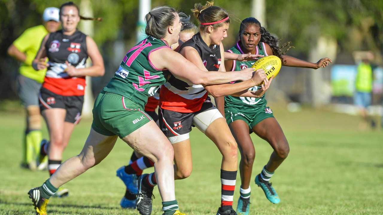 BITS Saints Sophie Ure looks to get a handball away against Gladstone Mudcrabs. Picture: Matt Taylor GLA190518AFLW