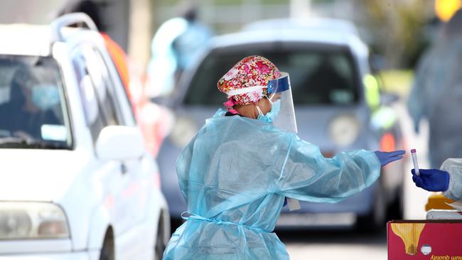 A nurse gets a test for a member of the community at the Mangere Town Centre Covid-19 testing centre in Auckland today. Picture: Getty Images