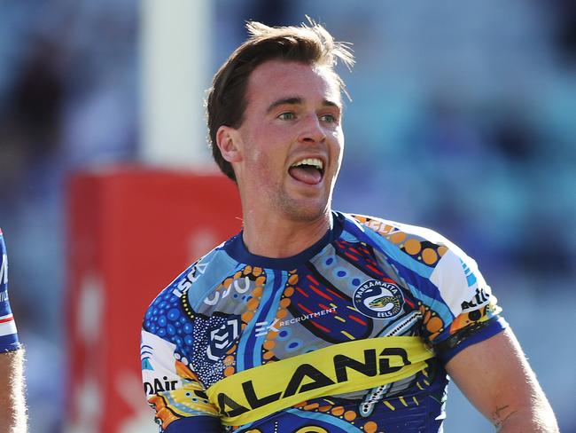 Parramatta's Clint Gutherson celebrates after scoring his first try during the NRL match between the Bulldogs and Parramatta at ANZ Stadium, Homebush. Picture: Brett Costello