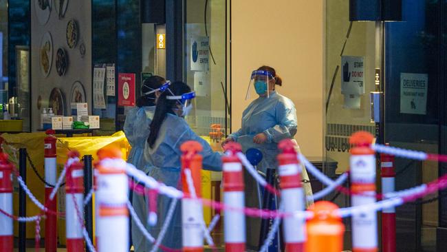 02/06/2021 Quarantine staff at the Novotel on 399 Little Lonsdale street in the Melbourne CBD which is being used as a hotel quarantine for returning travellers. Aaron Francis/The Australian